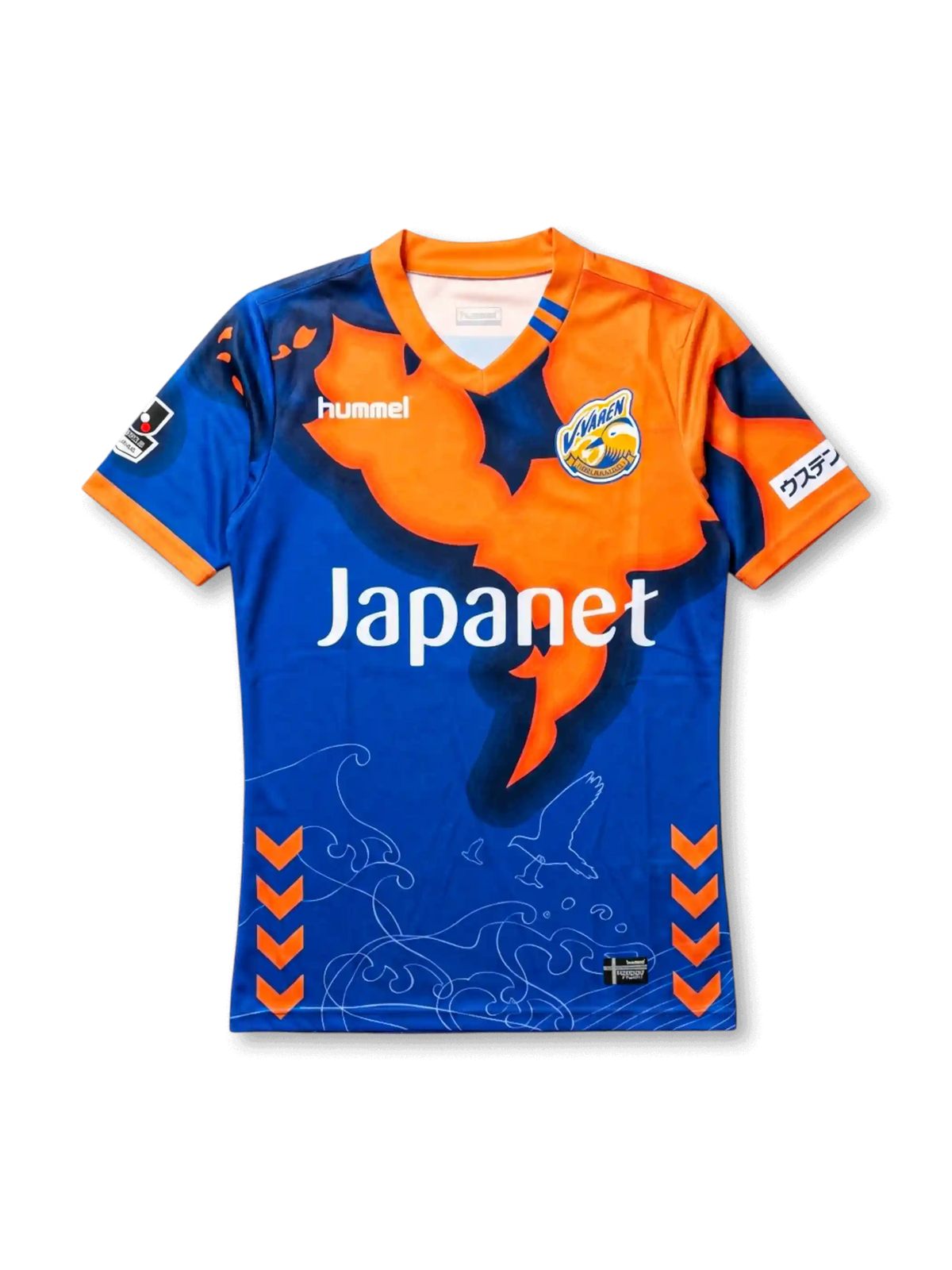 front view of V-Varen Nagasaki 2018 home shirt with blue and orange graphic design, V-neck collar, Hummel logo, club crest, Japanet sponsor, J.League sleeve patch, orange chevron accents, wave lines, and bird graphic details