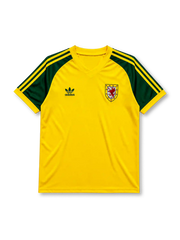 Wales 1982 away football shirt by Adidas in yellow with green three-stripe sleeves and FAW crest