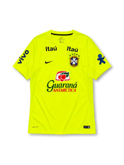 Brazil 2020 training football shirt by Nike in fluorescent yellow-green with multiple sponsor logos
