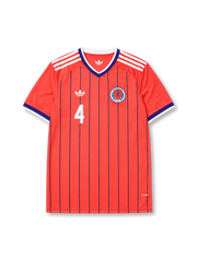Scotland 2026 away shirt with MCTOMINAY #4, coral-orange body, navy vertical pinstripes, Scotland crest, Trefoil branding, and matching front and back player print.