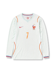 France 2026 away long sleeve football jersey with Antoine Griezmann #7, pale mint base, orange trim, France crest, and matching front and back player print.