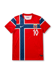 Norway 2026 World Cup home football jersey with ØDEGAARD #10, red body, oversized navy cross, white trim, federation crest, and matching front and back player print.