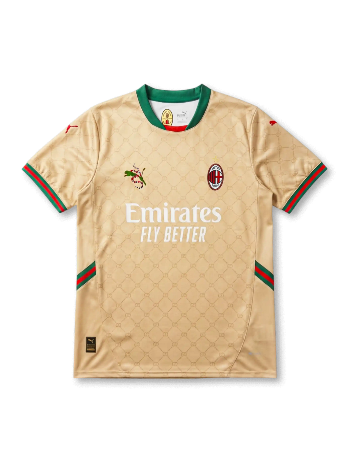 Front view of AC Milan special edition shirt in gold with monogram pattern, Emirates Fly Better sponsor, green collar, and red-green trim accents.