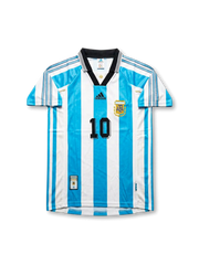 Front view of Argentina 1998 World Cup home shirt with sky blue and white stripes, black collar, AFA crest, adidas logo, and number 10 on the front.