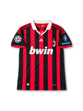 AC Milan Home Jersey David Beckham #32, retro adidas soccer shirt featuring the iconic red and black vertical stripes, AC Milan club crest, and Beckham name and number 32 on the back.