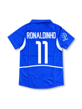 Front view of Brazil 2002 World Cup away shirt with blue body, white side panels, Brazil crest, #11 chest number, and Korea/Japan 2002 sleeve detail.
