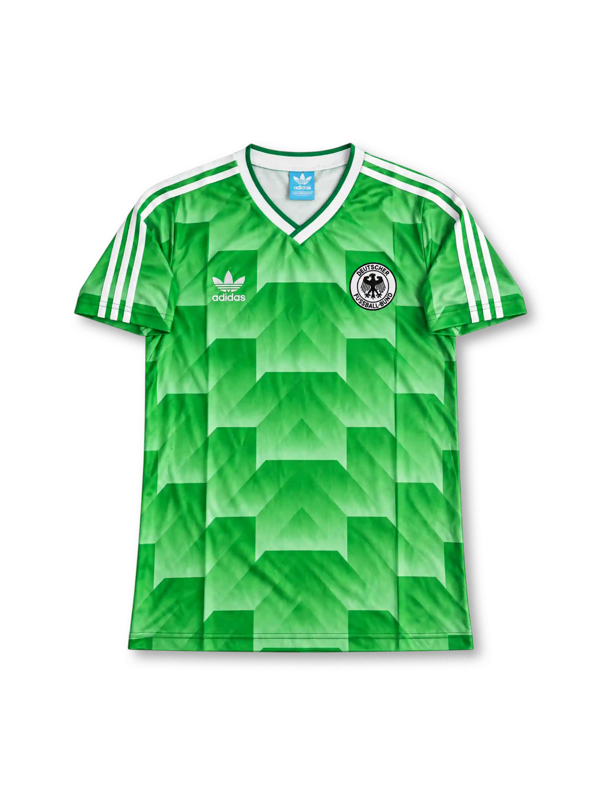 Front view of Germany 1990 World Cup away shirt with green geometric pattern, Germany crest, white V-neck collar, and white shoulder stripes.