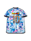 Front view of Japan Dragon Ball Super collaboration shirt with all-over manga panel graphics, Japan chest patch, central #10 detail, and black trim.