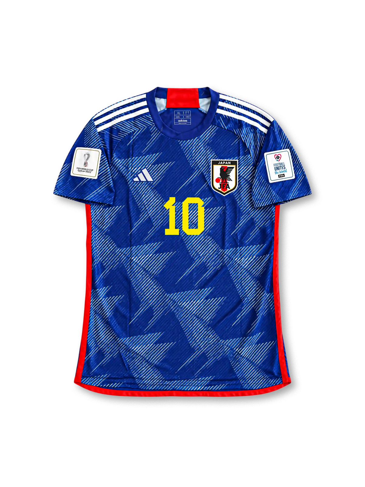 Front view of Japan 2022 World Cup home shirt with blue origami-inspired pattern, Japan crest, yellow #10 print, red trim, and Qatar 2022 sleeve patch.