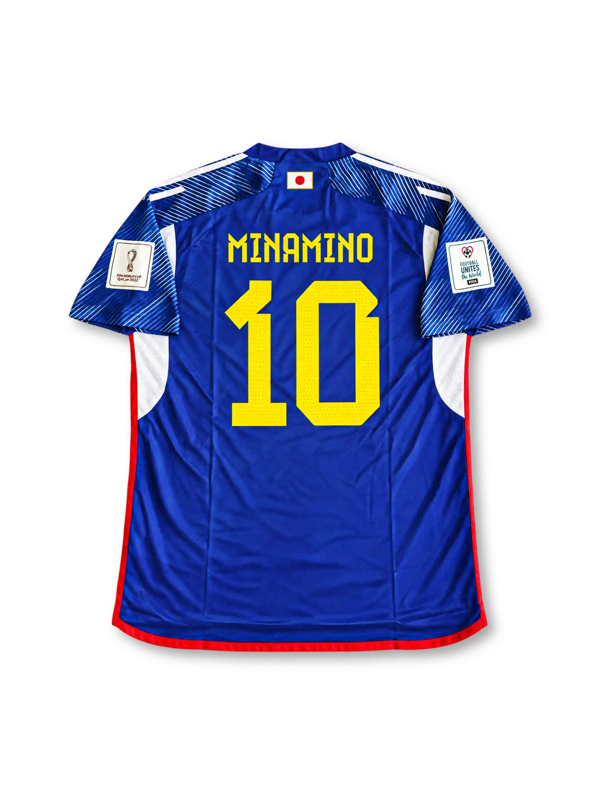 Front view of Japan 2022 World Cup home shirt with blue origami-inspired pattern, Japan crest, yellow #10 print, red trim, and Qatar 2022 sleeve patch.