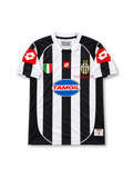Front view of Juventus 2002-03 home jersey with black-and-white stripes, Tamoil sponsor, Scudetto shield, two-star crest, and red sleeve panels.
