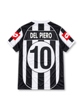 Front view of Juventus 2002-03 home jersey with black-and-white stripes, Tamoil sponsor, Scudetto shield, two-star crest, and red sleeve panels.