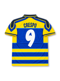 Parma AC 1999-00 home jersey featuring Hernan Crespo #9, Champion yellow and blue horizontal stripes, navy polo collar, Champion shoulder detailing, Parmalat sponsor logo, club crest, and CRESPO name and number 9 on the back of this retro soccer jersey.