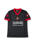 Front view of the black Iron Maiden The Book of Souls 2016 football jersey featuring a red V-neck collar, red sleeve trim, tonal all-over graphics, Eddie shield artwork, white band logo, and decorative sleeve patches.