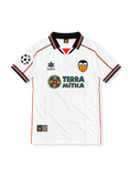Valencia CF 1999-00 home jersey by Luanvi, featuring a white body, black and orange trim, Terra Mítica sponsor, club crest and UEFA Champions League sleeve patch.
