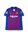 FC Barcelona 2018-19 home jersey featuring blue and garnet vertical stripes, yellow Nike Swoosh, Rakuten sponsor, club crest and Lionel Messi number 10.