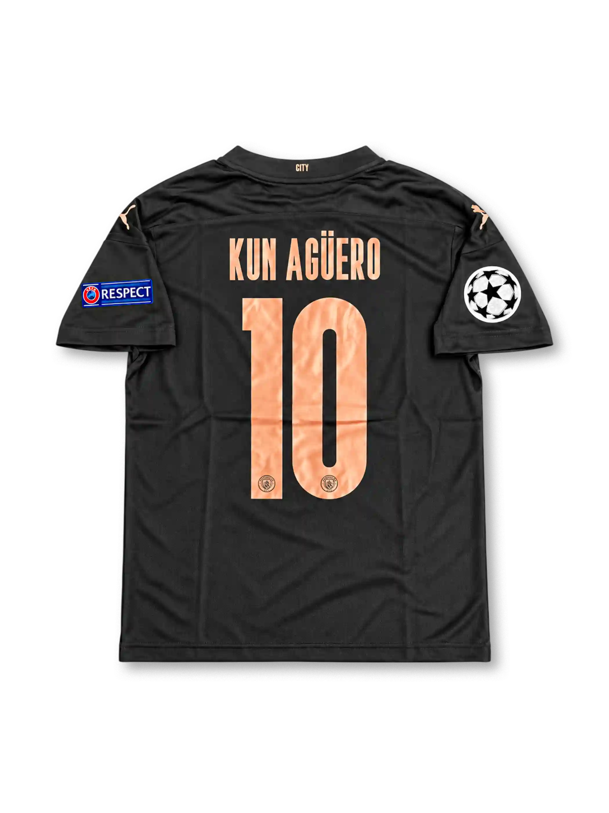 Manchester City 2020-21 dark navy and black PUMA away jersey featuring a geometric pattern, copper-colored club crest, PUMA logos, Etihad Airways sponsor and Sergio Aguero number 10.