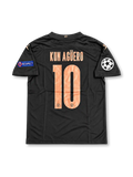 Manchester City 2020-21 dark navy and black PUMA away jersey featuring a geometric pattern, copper-colored club crest, PUMA logos, Etihad Airways sponsor and Sergio Aguero number 10.