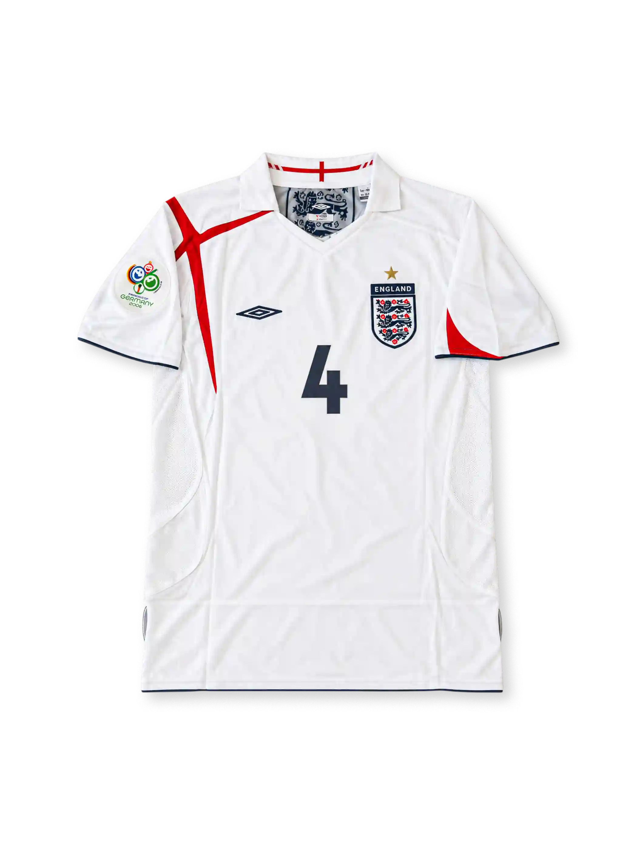 England 2005-07 white Umbro home jersey featuring asymmetric red St George's Cross detailing, navy trim, Three Lions crest, Germany 2006 World Cup sleeve patch and Steven Gerrard number 4.