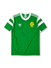 Cameroon 1990 World Cup home jersey in green with white shoulder stripes and Indomitable Lions crest