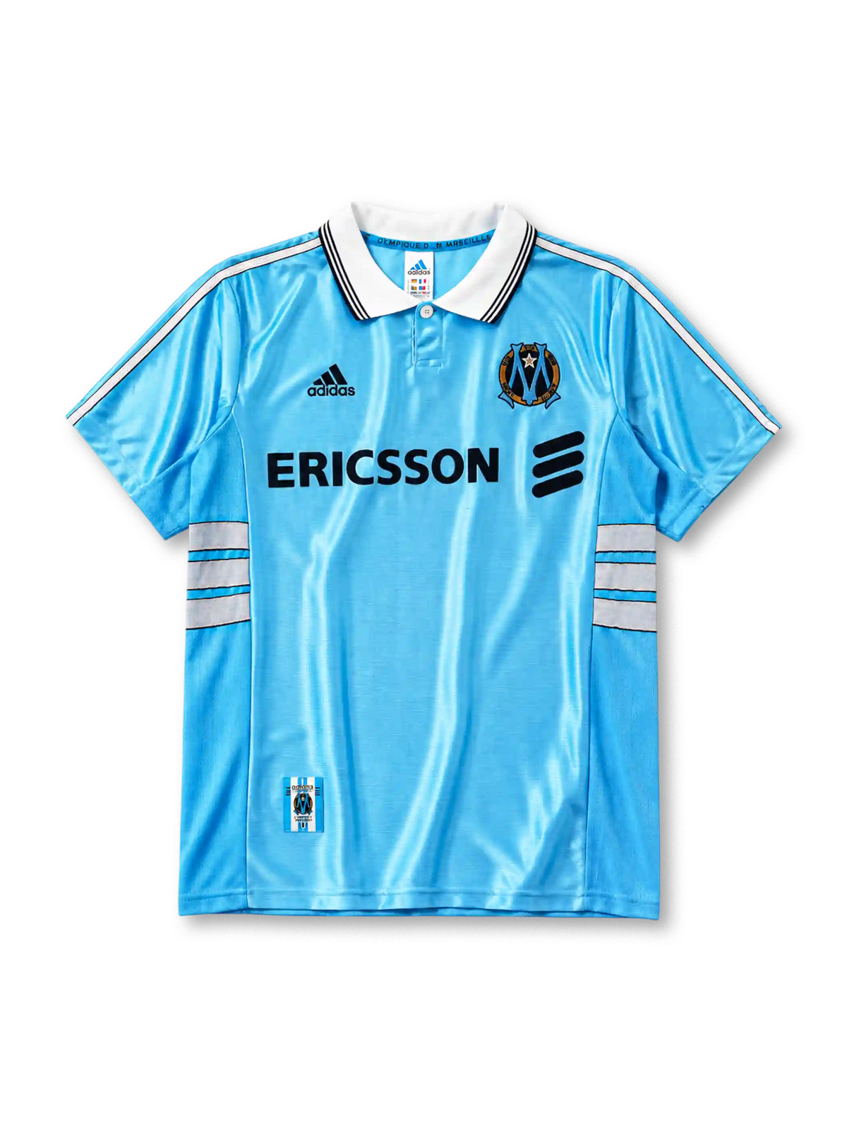 Olympique Marseille 1998/99 away jersey in sky blue with white stripe detailing and Ericsson branding