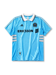Olympique Marseille 1998/99 away jersey in sky blue with white stripe detailing and Ericsson branding