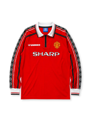 Manchester United 1998/99 home long sleeve jersey in red with diamond-pattern sleeve tape and Sharp branding