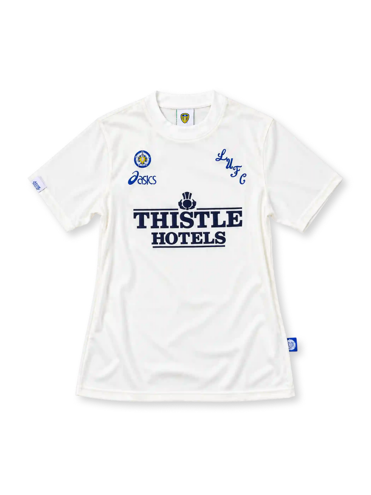 Leeds United 1995/96 white home jersey featuring blue ASICS branding, LUFC chest lettering, and navy Thistle Hotels sponsor, front view.