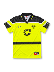 Borussia Dortmund 1996/97 Champions League home jersey in neon yellow with black shoulder panels, Nike logo, BVB 09 crest, and Continentale sponsor, front view.