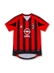 AC Milan 2004/05 home jersey with red-and-black vertical stripes, adidas logo, Opel sponsor, club crest, and gold star, front view.
