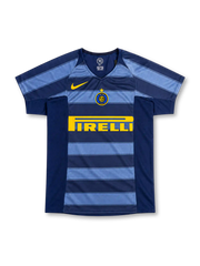 Inter Milan 2004/05 third jersey featuring navy and light blue horizontal stripes, yellow Nike Swoosh, central club crest, and Pirelli sponsor, front view.