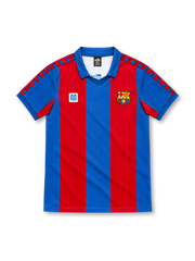 Barcelona 1980–82 home jersey with red and blue vertical stripes, blue collar, checkerboard shoulder trim, Meyba emblem and club crest.