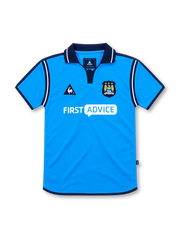 Manchester City 2002/03 sky-blue home jersey with navy collar, white piping, Le Coq Sportif logo, three-star club crest and First Advice sponsor.