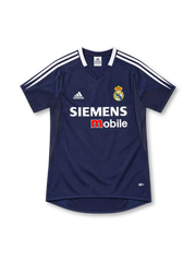 Real Madrid 2004/05 navy away jersey with white adidas shoulder stripes, V-neck collar, club crest and Siemens mobile sponsor.