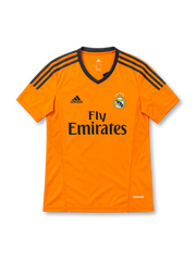 Real Madrid 2013/14 third jersey in bright orange with navy adidas stripes and Fly Emirates sponsor