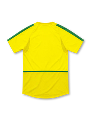 Brazil 2002 yellow home jersey by Nike with green shoulder stripes, curved green side panels, green Nike Swoosh and four-star CBF crest.