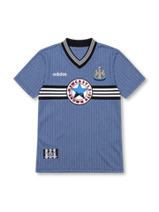 Newcastle United 1995/96 sky-blue away jersey with black-and-white chest stripes, white adidas logo, club crest and Newcastle Brown Ale sponsor.