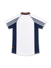 Spain 1998 white away jersey with navy side panels, adidas three-stripe sleeves, red-and-yellow V-neck trim, Spanish federation crest and lower-hem emblem.