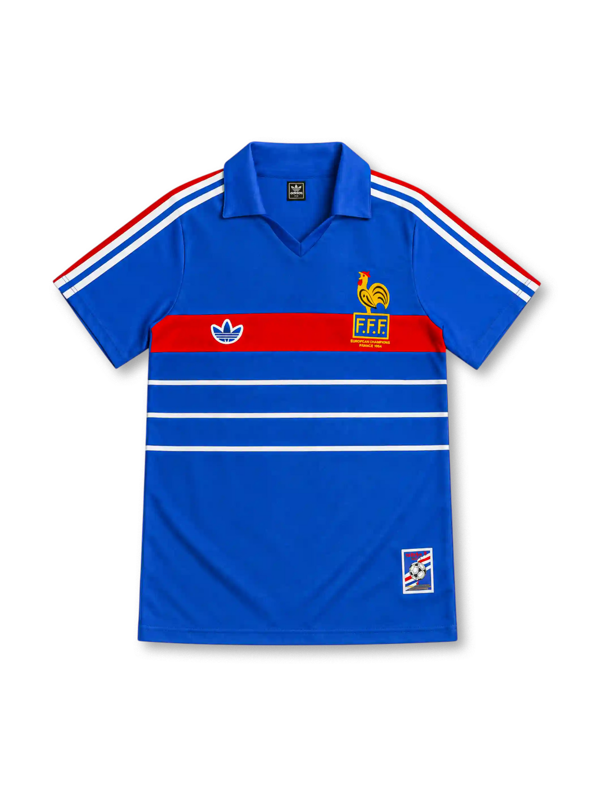 France 1984 royal-blue home jersey with red chest band, white horizontal stripes, tricolor adidas shoulder stripes, yellow FFF rooster crest and commemorative hem patch.