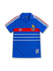 France 1984 royal-blue home jersey with red chest band, white horizontal stripes, tricolor adidas shoulder stripes, yellow FFF rooster crest and commemorative hem patch.