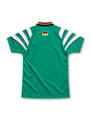 Germany 1996 green away jersey with sweeping white adidas shoulder stripes, black V-neck collar with German flag trim, white adidas logo, three-star DFB crest and lower-hem federation patch.