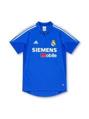 Real Madrid 2004/05 royal-blue third jersey with white adidas shoulder stripes, blue fold-down collar, club crest, Siemens mobile chest sponsor and ClimaCool branding.