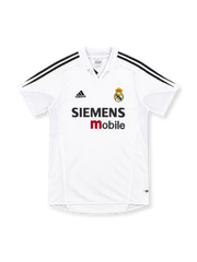 Real Madrid 2004/05 white home jersey with black adidas three-stripe shoulders, white fold-down collar, club crest, Siemens mobile sponsor and ClimaCool branding.