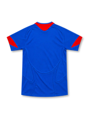 Manchester United 2005/06 royal-blue away jersey with red curved shoulder panels, red-trimmed V-neck collar, white Nike Swoosh, central club crest, white Vodafone sponsor and red side accents.