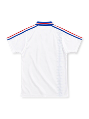 France 1994 white adidas away jersey with red-and-blue diamond graphics down the right side, royal-blue polo collar with tricolor trim, blue shoulder stripes, adidas wordmark and FFF rooster crest.