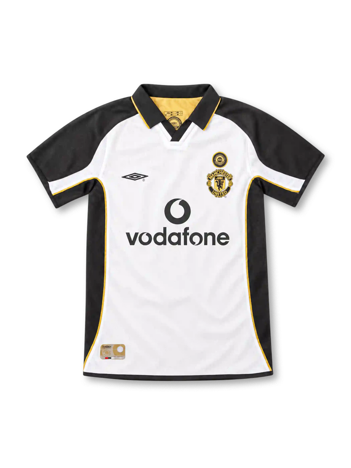 Manchester United 2001/02 centenary away jersey by Umbro in white and black with gold piping, a black polo collar, special centenary crest, black Vodafone sponsor, and commemorative hem label.