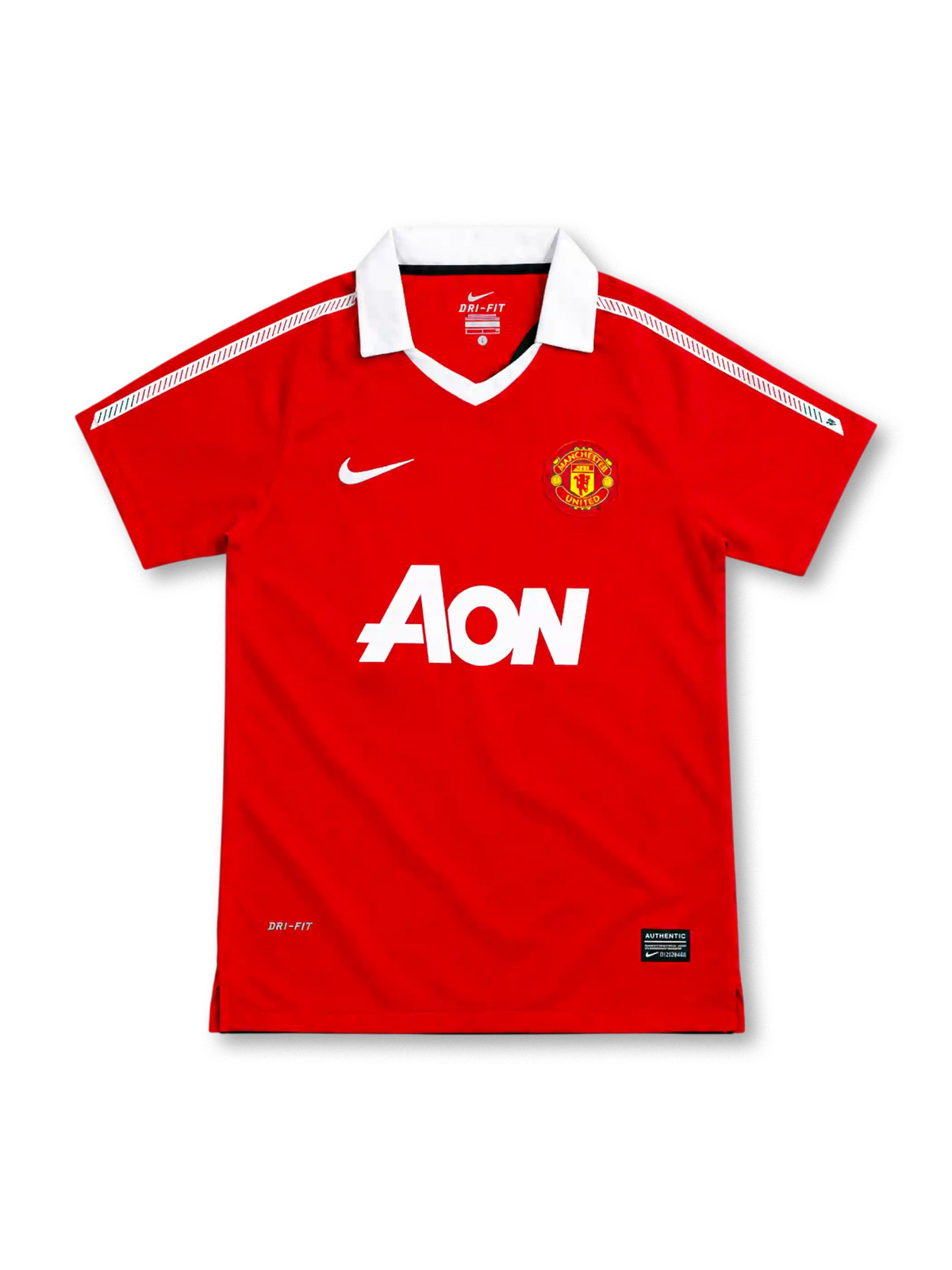Manchester United 2010/11 red Nike home jersey featuring a white fold-down V-neck collar, patterned white shoulder stripes, white Nike Swoosh, club crest, large Aon sponsor, Dri-FIT branding, and black Authentic-style hem label.