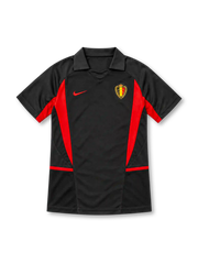 Belgium 2002 black away jersey with red angular panels, polo collar, Nike logo and federation crest