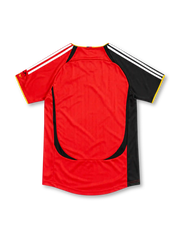 Germany 2006 red away jersey with black panel, gold piping, adidas logo and three-star DFB crest