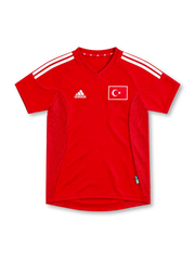 Turkey 2002 red home jersey with white adidas stripes, red mesh side panels and flag emblem